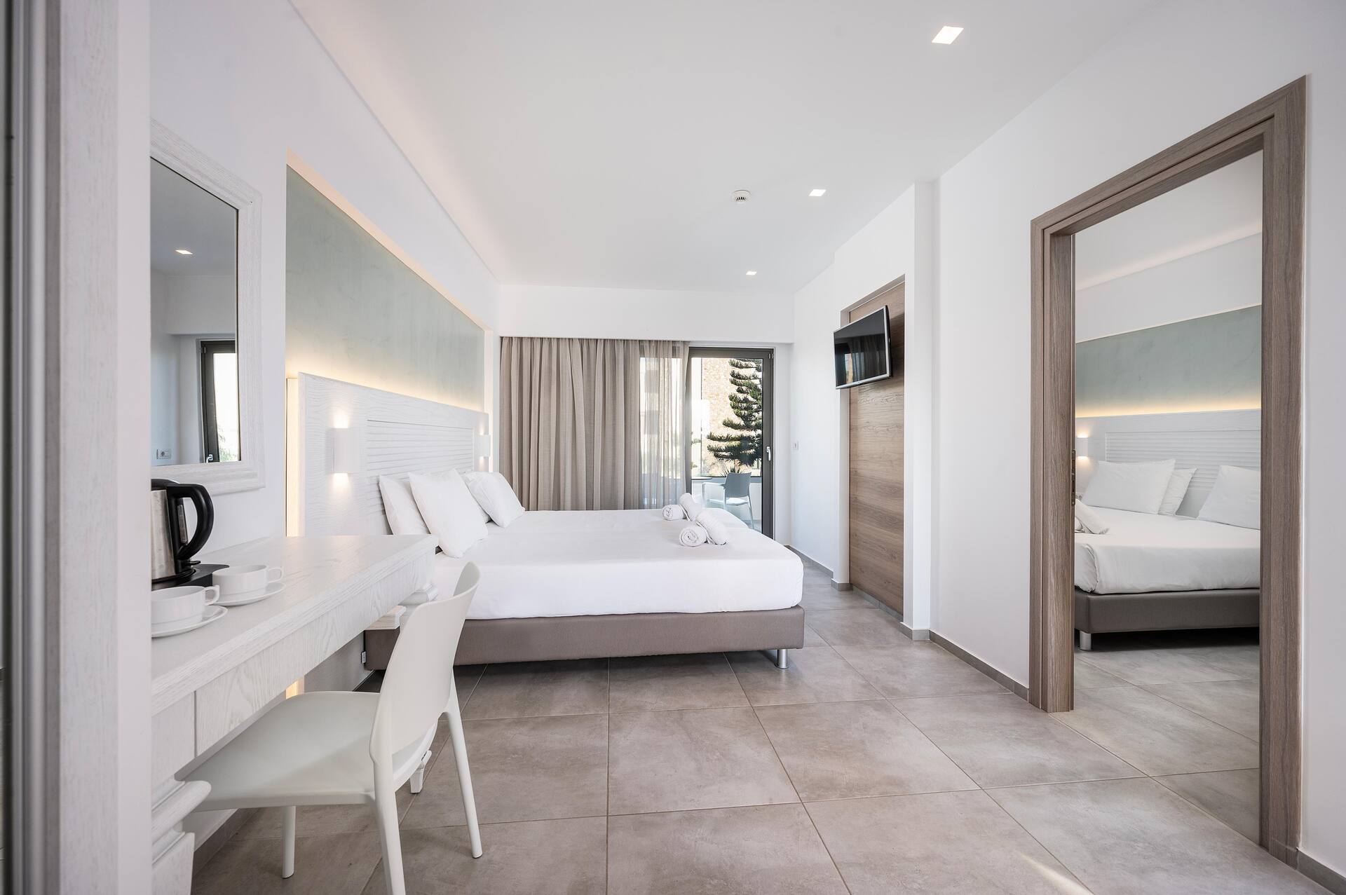 <p>Deluxe-perhehuone, kaksi makuuhuonetta</p>